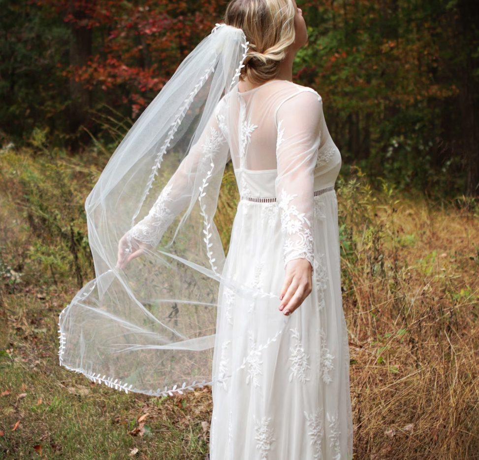 Leaf edge Veil worn by Bride and shown from the rear